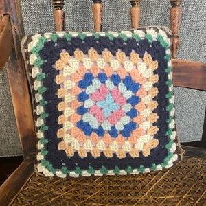 Granny square crocheted pillow